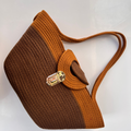 Sac cabas Philae Niléa en corde de coton tressée marron et terracotta, fermeture dorée, design artisanal égyptien.