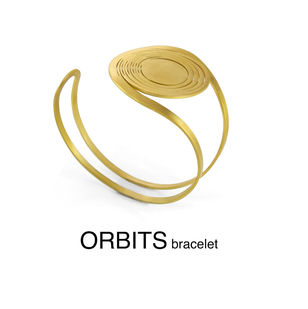 Bracelet Liquify Orbit avec cercle interchangeable – exemple de variation du même bijou modulable.